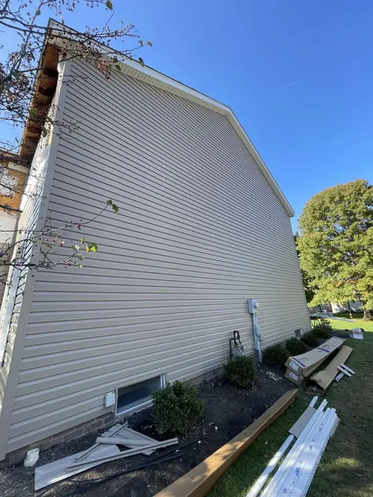 Beige siding transformation, finished exterior view