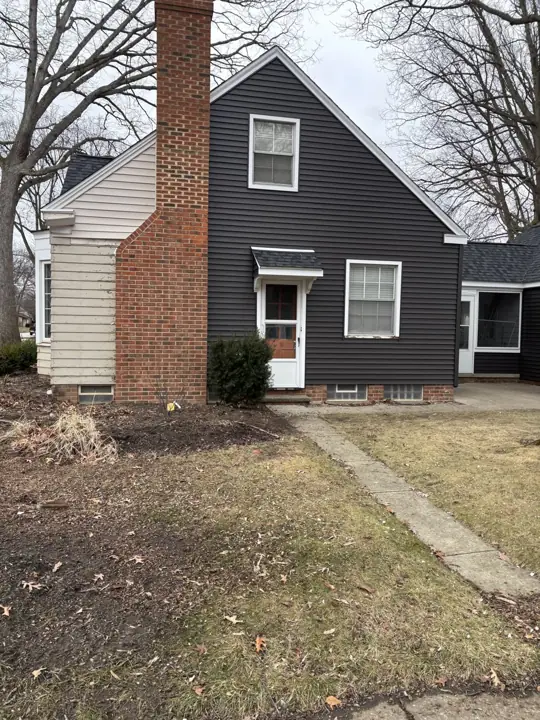 Residential siding work, before exterior view