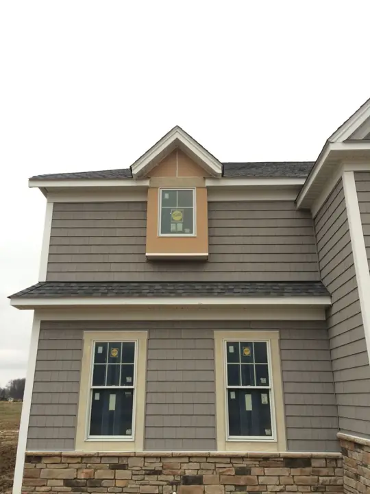 New-home exterior, in progress exterior view