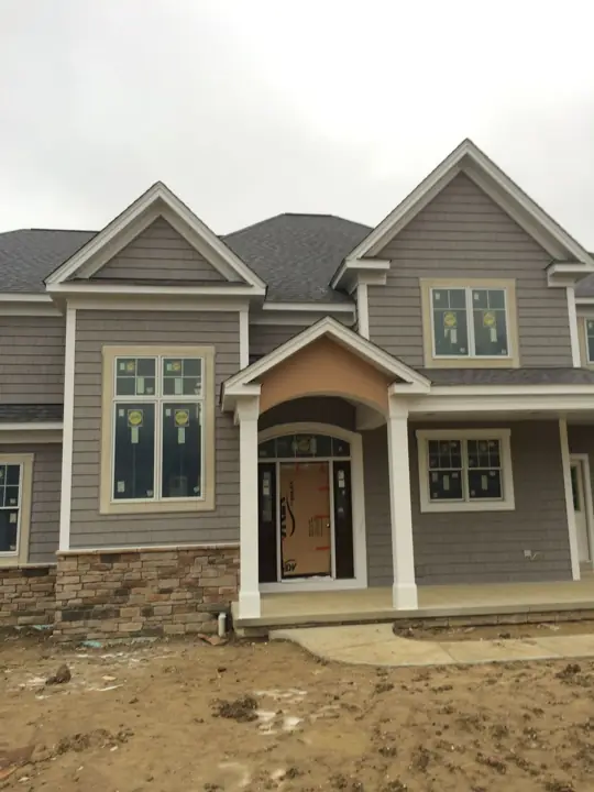 New-home exterior, in progress exterior view