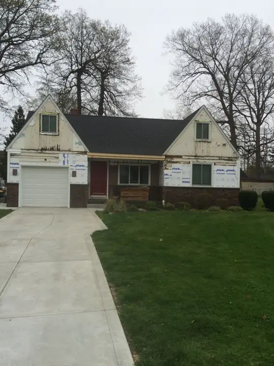 Cape Cod transformation, before exterior view