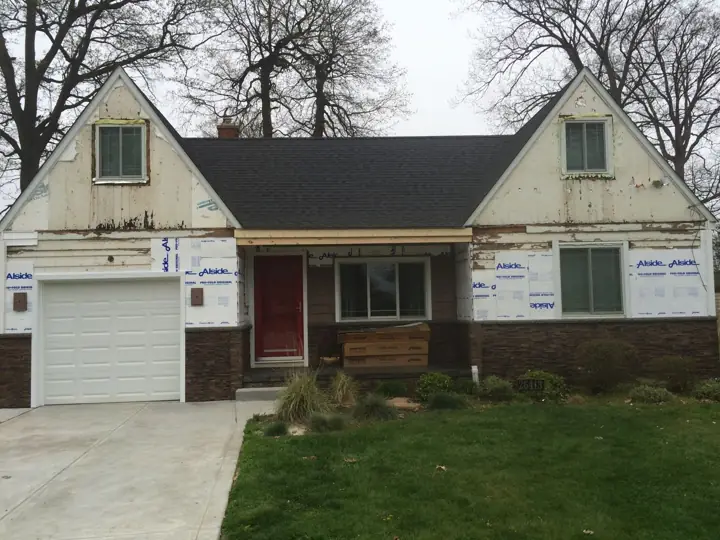 Cape Cod transformation, in progress exterior view