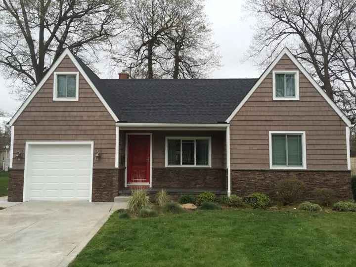 Cape Cod transformation, finished exterior view